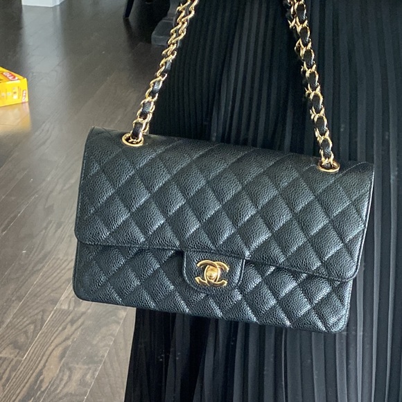 CHANEL Handbags - Chanel gold caviar leather in medium